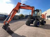 2011 Hitachi ZX140W-3 wheel excavator, side profile view
