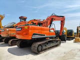 2020 Doosan DX225LC crawler excavator, rear three-quarter view