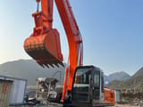 2024 Hitachi ZX240 crawler excavator, front three-quarter view