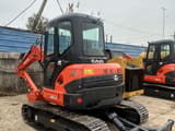 2022 Kubota U55-4 mini excavator, front three-quarter view