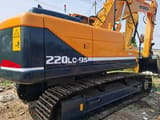 2023 Hyundai 220LC-9S crawler excavator, rear three-quarter view