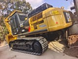 2025 Caterpillar 336D crawler excavator, rear three-quarter view