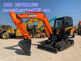 2023 MAN DX60 (Doosan DH60-7) mini excavator, side view