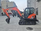 2024 Doosan DX60-9C mini excavator side view