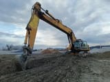 2000 Liebherr R964 crawler excavator, side view