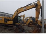 2021 Caterpillar 320-07 crawler excavator, side profile view