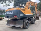 2022 Hyundai R210W-9 wheel excavator rear three-quarter view
