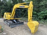 2024 Komatsu PC70-8 mini excavator, rear three-quarter view