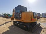 2020 Caterpillar 308E2 mini excavator, rear three-quarter view