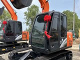 2024 Hitachi Zaxis 70 crawler excavator, front three-quarter view