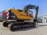 2023 Volvo EC210BLC crawler excavator, rear three-quarter view