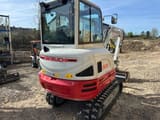 2025 Takeuchi TB230 V3 mini excavator, rear three-quarter view