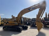 2012 Caterpillar 320BL crawler excavator, side profile view