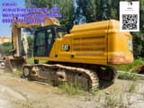 2023 Caterpillar 349 crawler excavator, rear three-quarter view