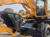 2025 Hyundai R210W-9 wheel excavator front three-quarter view