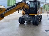 2021 Liebherr A914 COMPACT wheel excavator, side view
