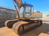 CASE 9033 crawler excavator, side view
