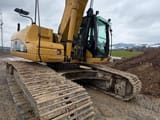 2007 Caterpillar 325DL crawler excavator, rear three-quarter view