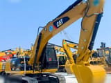 Gąsienicowa koparka Caterpillar 320D2 z 2013 roku, widok z boku