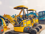 2024 Komatsu PC30MR mini excavator, rear three-quarter view