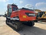 2020 Doosan DX225LCA crawler excavator rear three-quarter view