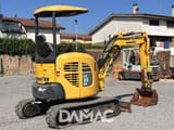 2014 Komatsu PC26MR-3 mini excavator, side view