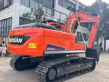 2023 Doosan DX225LCA crawler excavator, rear three-quarter view
