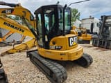 2018 Caterpillar 305.5E2 mini excavator, rear three-quarter view