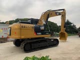 2023 Caterpillar 323D2L crawler excavator, rear three-quarter view