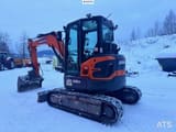 2022 Doosan DX50Z-7 mini excavator, rear three-quarter view
