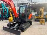 2022 Doosan DX60-9C mini excavator, front three-quarter view