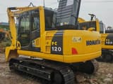Komatsu PC120-6 crawler excavator, rear three-quarter view