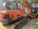 2011 Doosan DX60-9C mini excavator rear three-quarter view