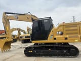 2023 Caterpillar 320GC crawler excavator side view