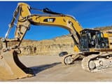 2013 Caterpillar 374FL crawler excavator, side view