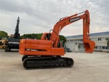 2022 Doosan DX140LC crawler excavator, side view