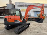2023 Doosan DX60-9C crawler excavator, side profile view