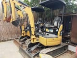 2018 Caterpillar 302C mini excavator, rear three-quarter view