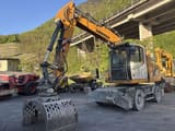 2019 Liebherr LH22 material handler, front three-quarter view