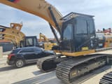 2025 Caterpillar 320D2 Raupenbagger, Front-Dreiviertelansicht