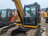 Caterpillar 307E mini excavator, front three-quarter view