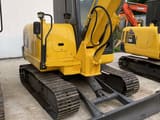2023 Komatsu PC56-7 mini excavator, rear three-quarter view