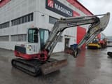 2016 Takeuchi TB250 mini excavator, side view