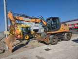 CASE WX148 wheel excavator, side profile view