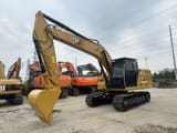 2023 Caterpillar 320GC crawler excavator, front three-quarter view