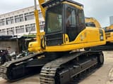 Komatsu PC300 crawler excavator, front three-quarter view