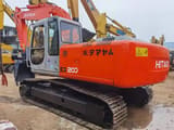 Hitachi EX200 crawler excavator, rear three-quarter view