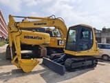 2018 Komatsu PC60-7 mini excavator, front three-quarter view