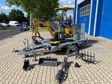 Berger Kraus BK1000JSR mini excavator on trailer with attachments