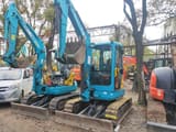2023 Kubota KX135-3S mini excavator, front three-quarter view